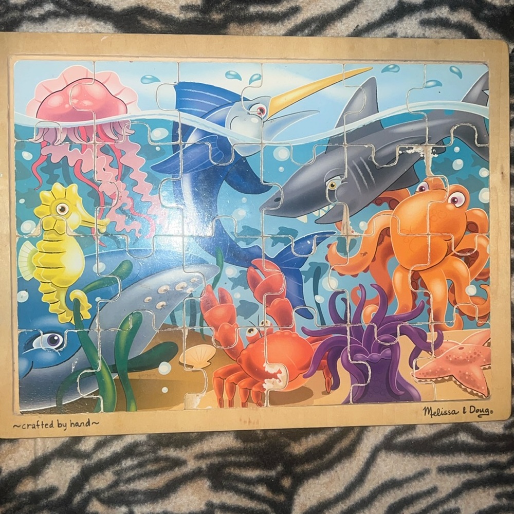 24-piece wooden jigsaw puzzle with an ocean theme
Melissa & Doug